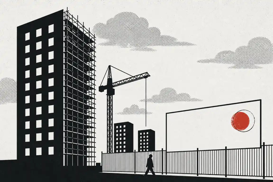 A scaffolded tower block stands behind a motionless crane on a fenced building site, next to a blank hoarding panel marked only with a single red stamp, as a lone figure walks past.